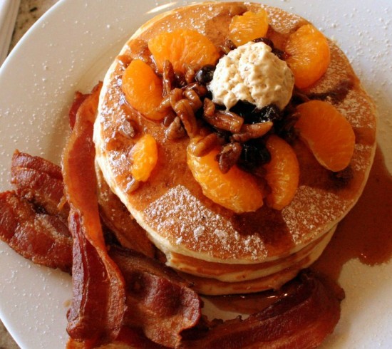 Citrus Pancakes - Roasted Pecan and Sun-dried Cranberry Pancakes served with House-made Orange Butter